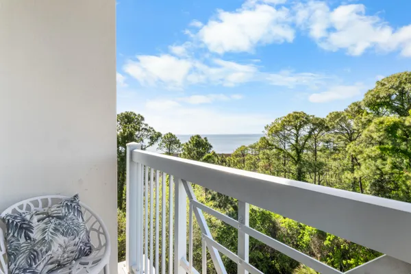 a balcony with an outdoor space