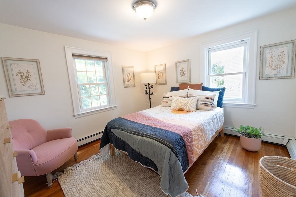 17 Eliot Road Belmont, MA 02478 - Photo 22 of 37 a bedroom with bed and a couch
