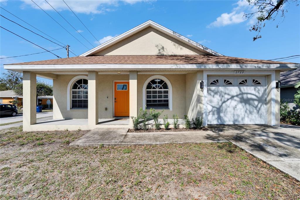 2723 West Arch Street Tampa, FL 33607 - Photo 1 of 1 a front view of a house with garden