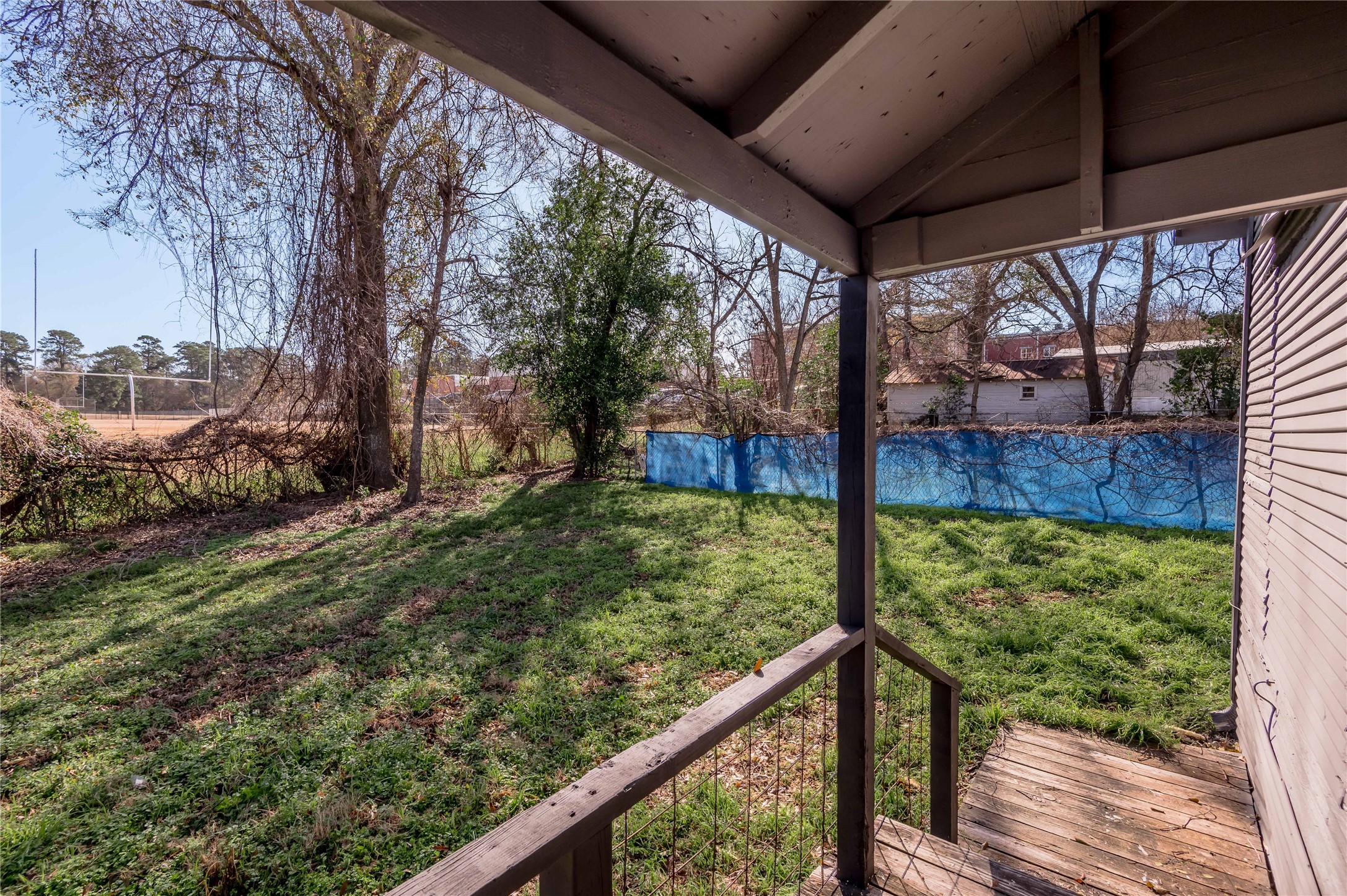 703 Avenue J Huntsville, TX 77320 - Photo 24 of 26 a view of a porch