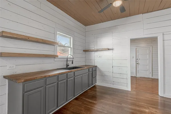 a view of a sink and dishwasher in a kitchen