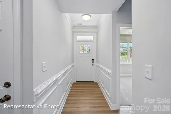 a view of a bathroom from the hallway