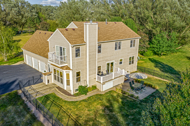 14N600 Timber Ridge Drive Elgin, IL 60124 - Photo 2 of 28 an aerial view of a house with a yard
