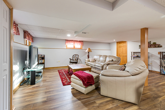 14N600 Timber Ridge Drive Elgin, IL 60124 - Photo 24 of 28 a living room with furniture and a couch