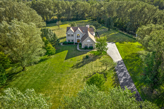 14N600 Timber Ridge Drive Elgin, IL 60124 - Photo 5 of 28 an aerial view of a house with a yard basket ball court and outdoor seating