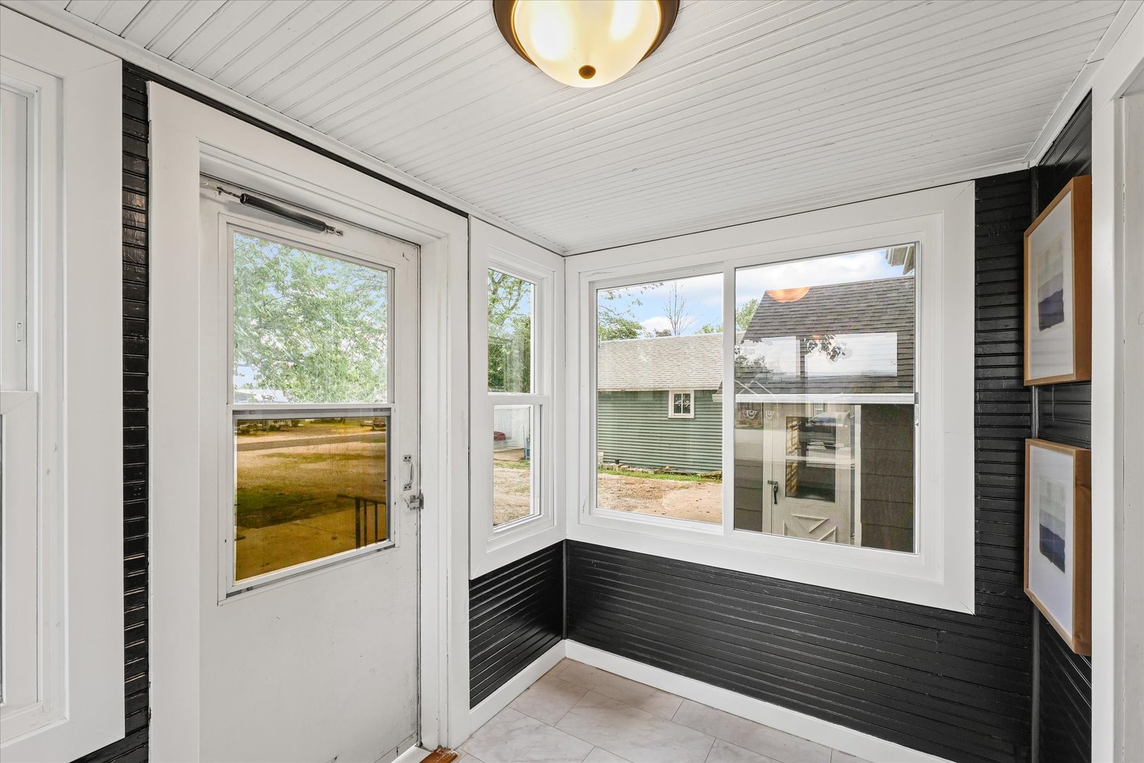 105 Madison Street Sibley, IL 61773 - Photo 18 of 22 a house that has a large window