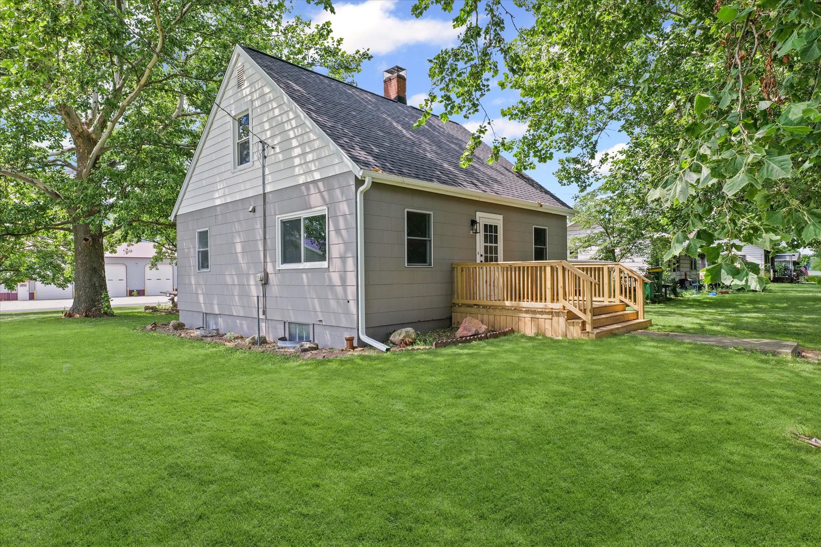 105 Madison Street Sibley, IL 61773 - Photo 20 of 22 a view of a house with a yard