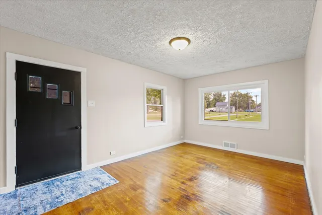 a view of a bedroom with a natural light