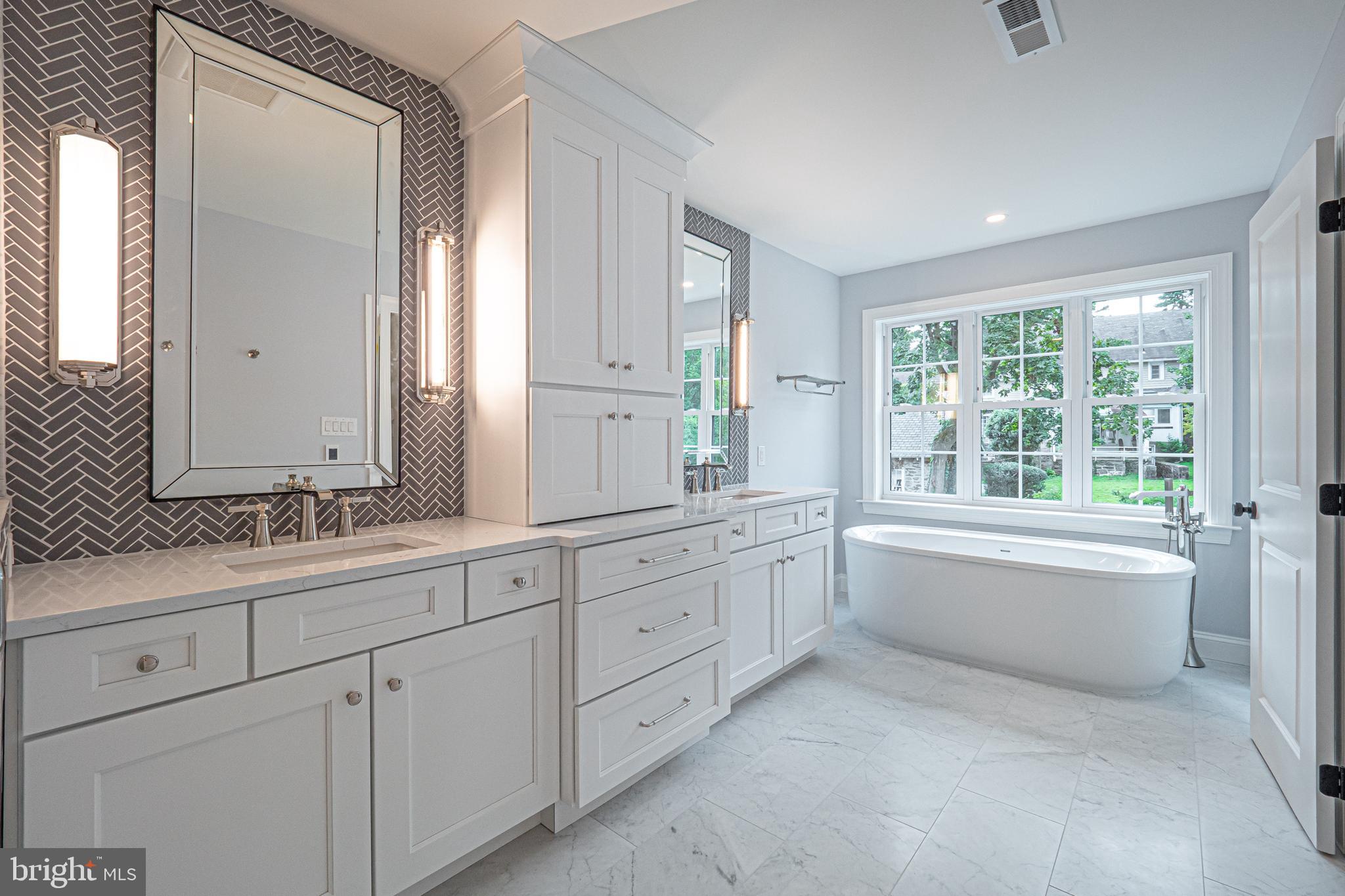 2 Timber Mill Lane, Unit SERENO Landenberg, PA 19350 - Photo 36 of 62 a bathroom with double vanity and a bathtub