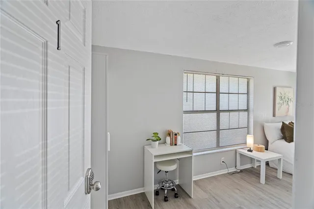 a workspace with wooden floor