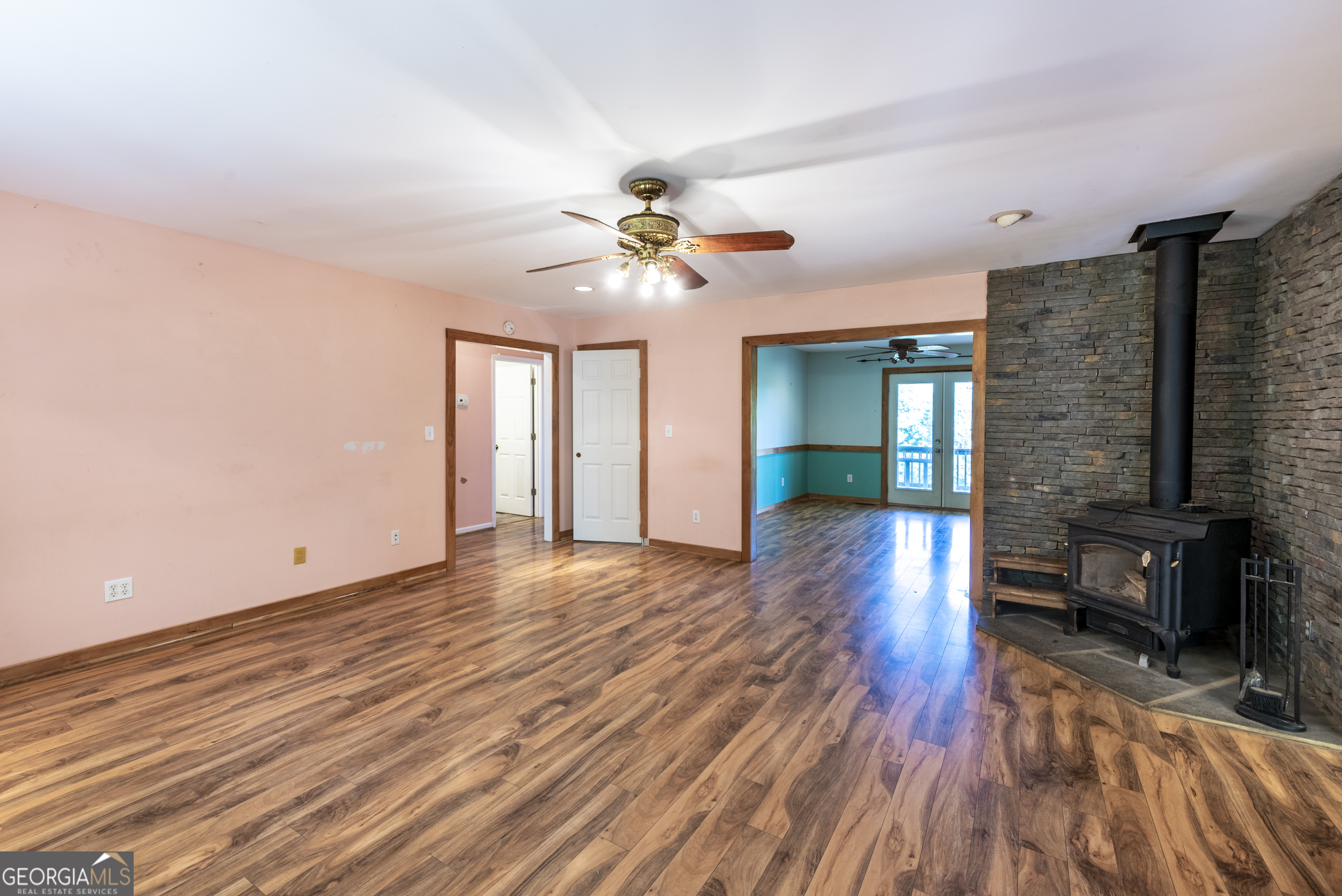 157 Edwards Road Fairmount, GA 30139 - Photo 16 of 72 a view of an empty room with a window and wooden floor