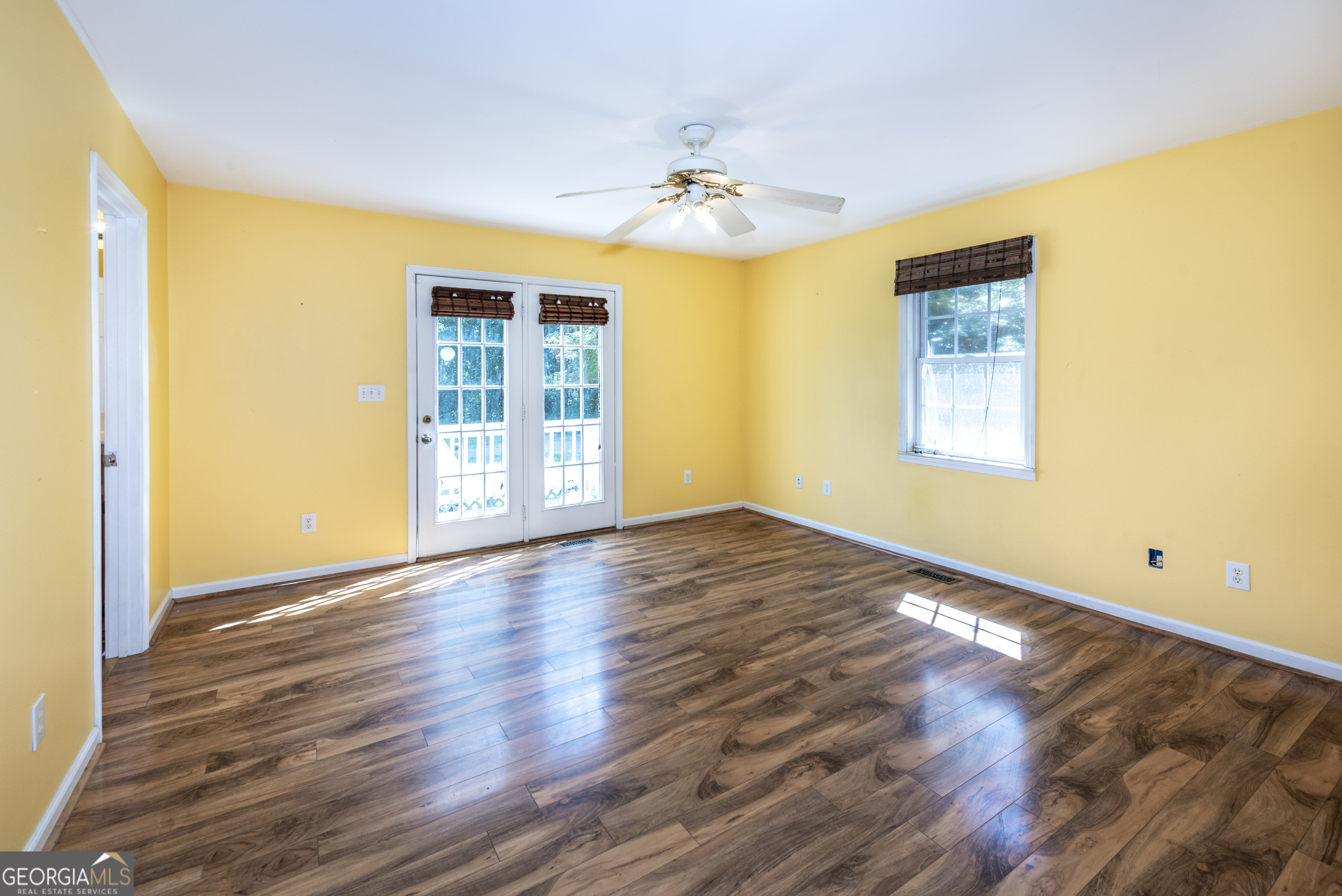 157 Edwards Road Fairmount, GA 30139 - Photo 20 of 72 a view of an empty room with wooden floor and a window