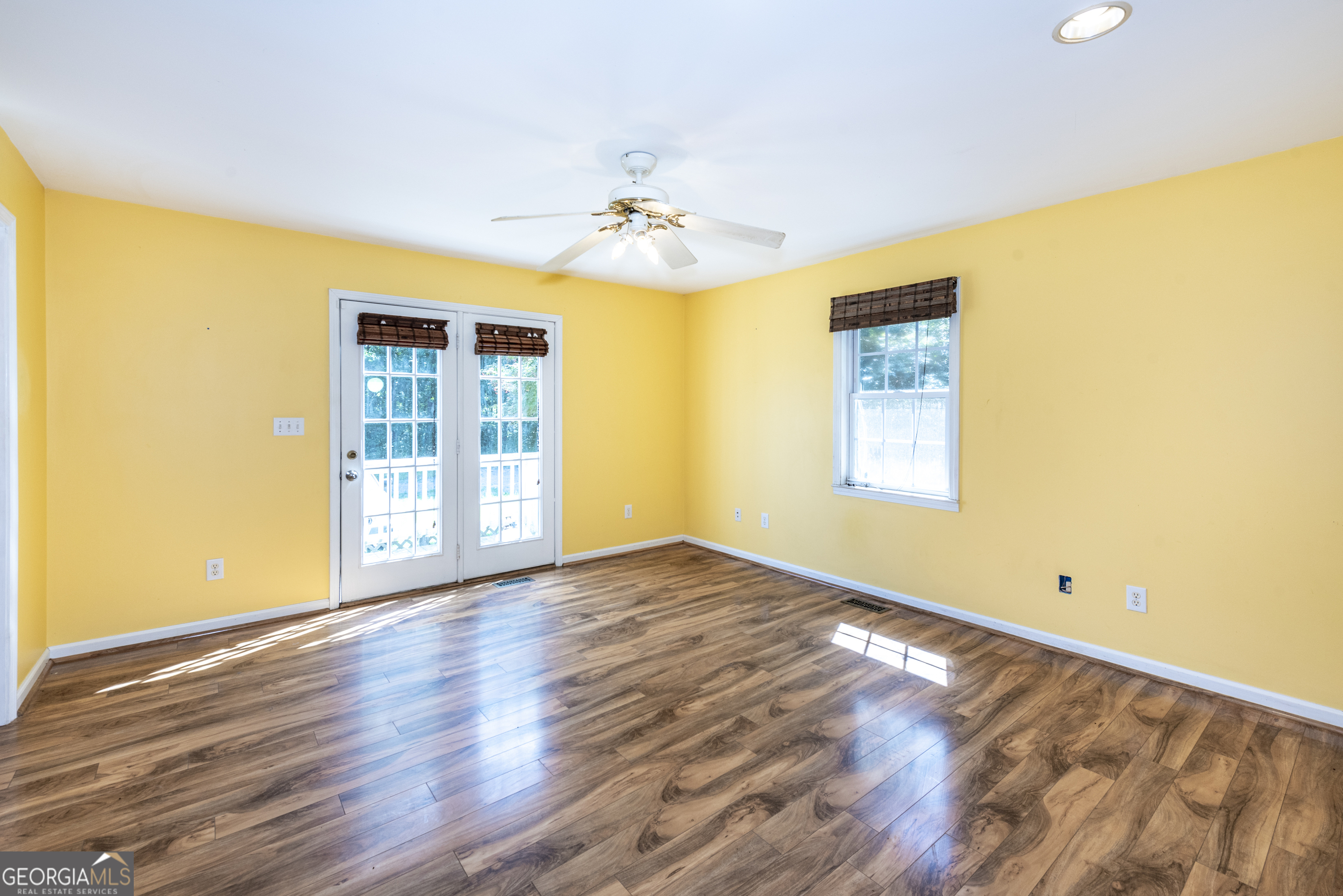 157 Edwards Road Fairmount, GA 30139 - Photo 21 of 72 a view of empty room with wooden floor and fan