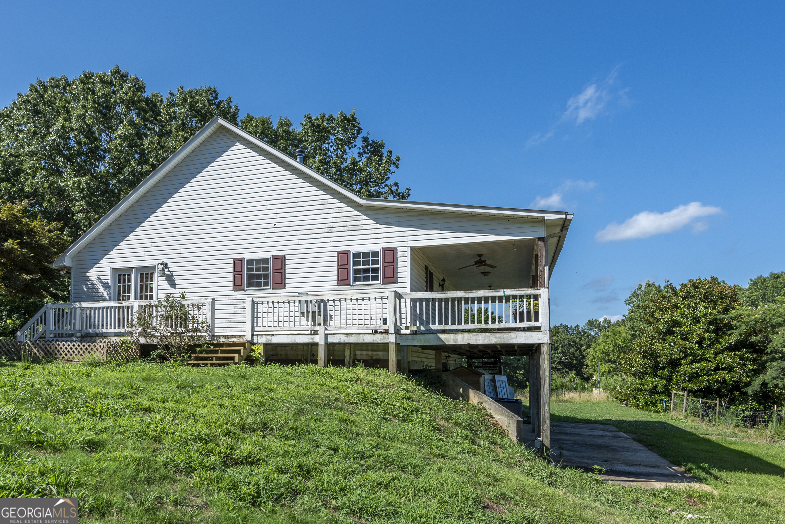 157 Edwards Road Fairmount, GA 30139 - Photo 3 of 72 a view of a house with a yard and plants