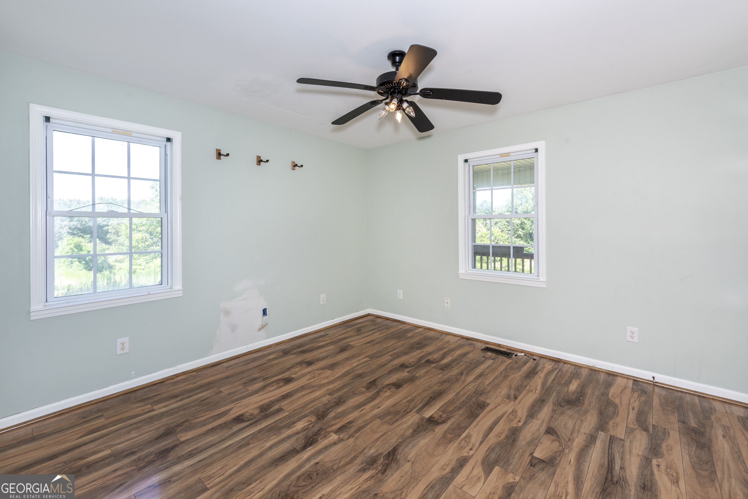 157 Edwards Road Fairmount, GA 30139 - Photo 32 of 72 an empty room with a window and a fan