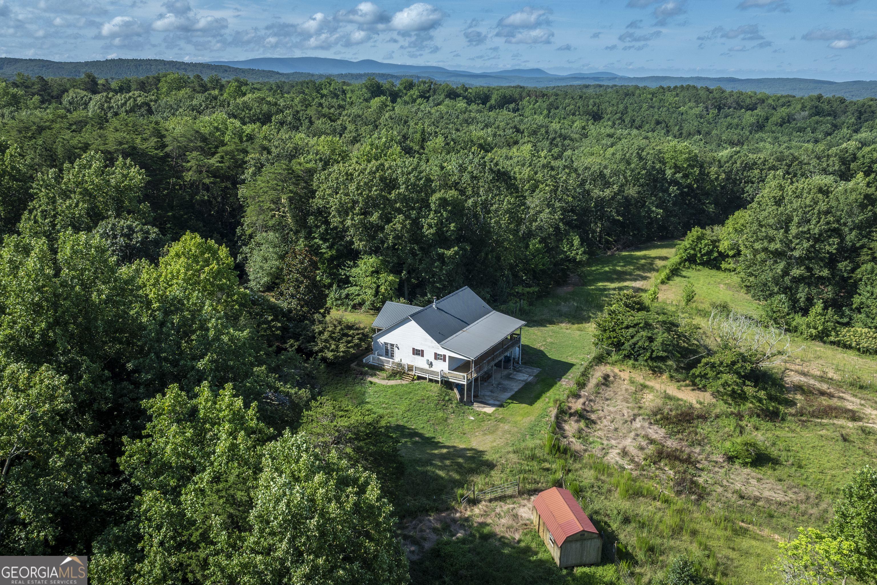 157 Edwards Road Fairmount, GA 30139 - Photo 43 of 72 an aerial view of a house with yard and outdoor seating