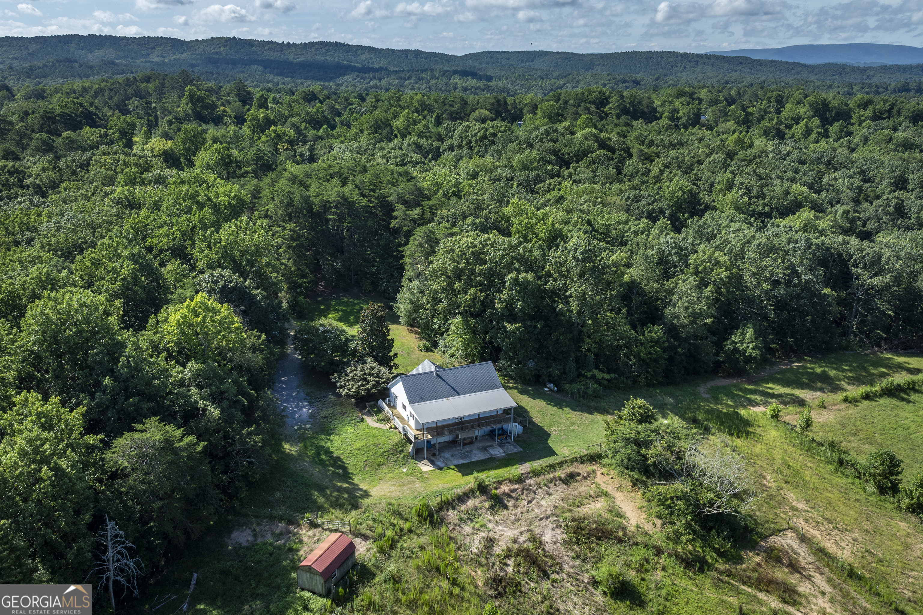 157 Edwards Road Fairmount, GA 30139 - Photo 49 of 72 an aerial view of a house with a yard