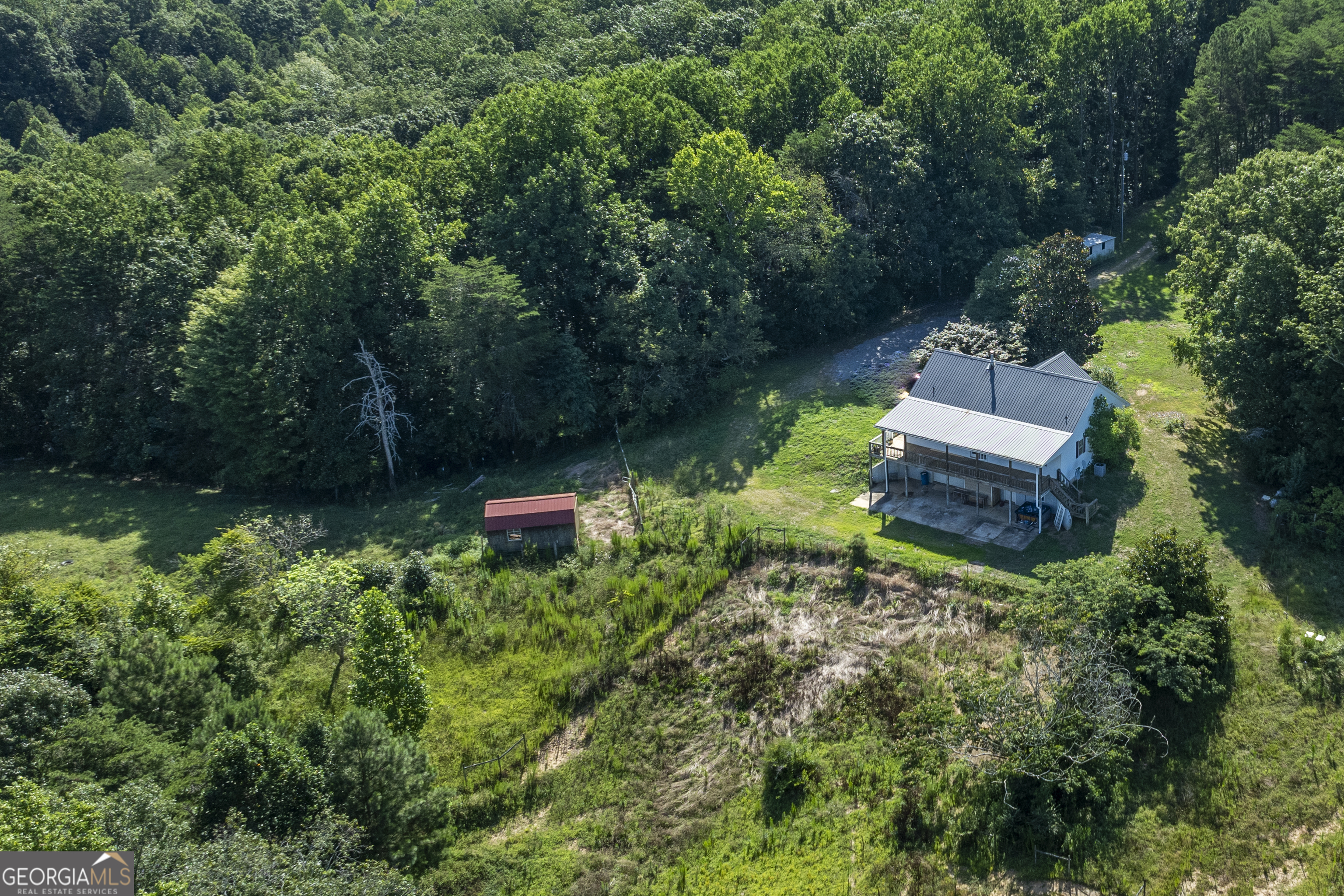 157 Edwards Road Fairmount, GA 30139 - Photo 52 of 72 an aerial view of a house with a yard and lake view