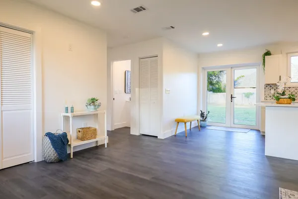a view of livingroom with furniture and a couch