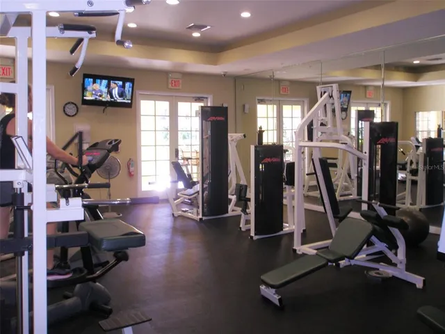 a room with furniture and wooden floor