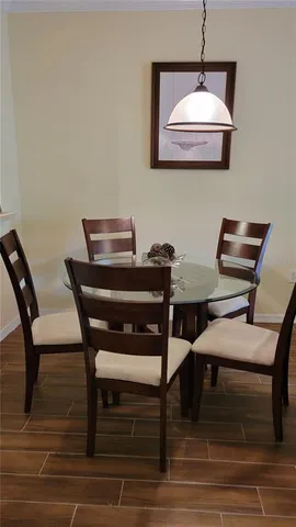 a view of a workspace with furniture