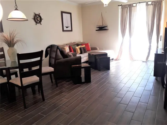 a living room with furniture and a couch