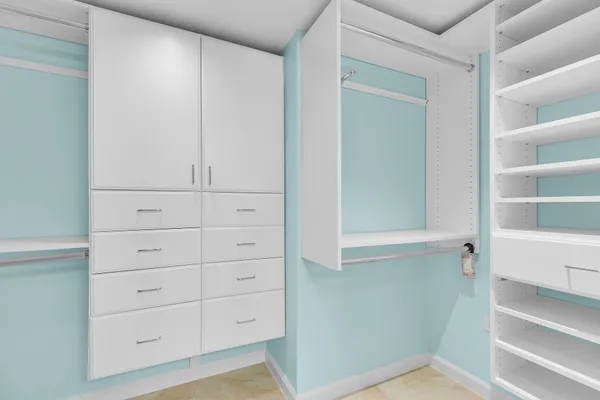 a view of an empty walk in closet