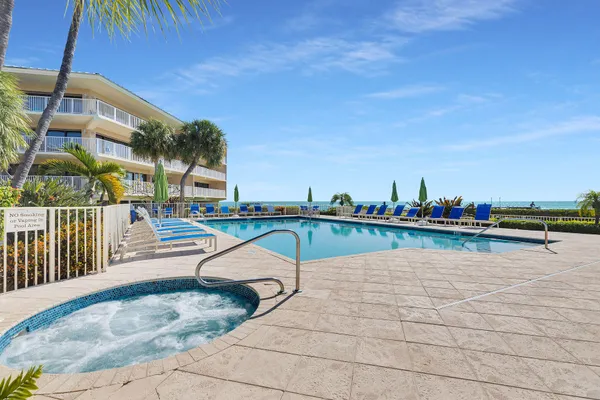 a view of a terrace with chairs