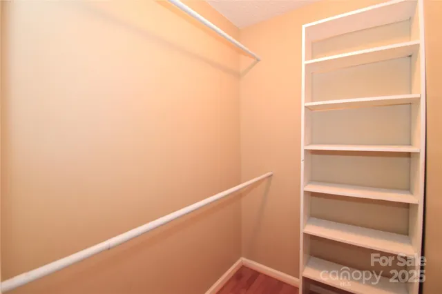 a view of a room with racks on the wall