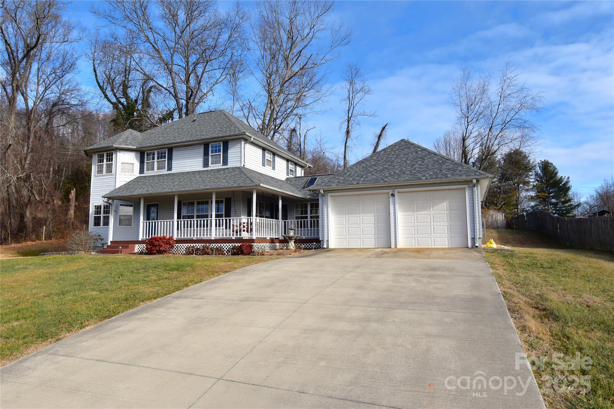 233 Ledbetter Road Arden, NC 28704 - Photo 33 of 45 a front view of a house with sitting space and garden