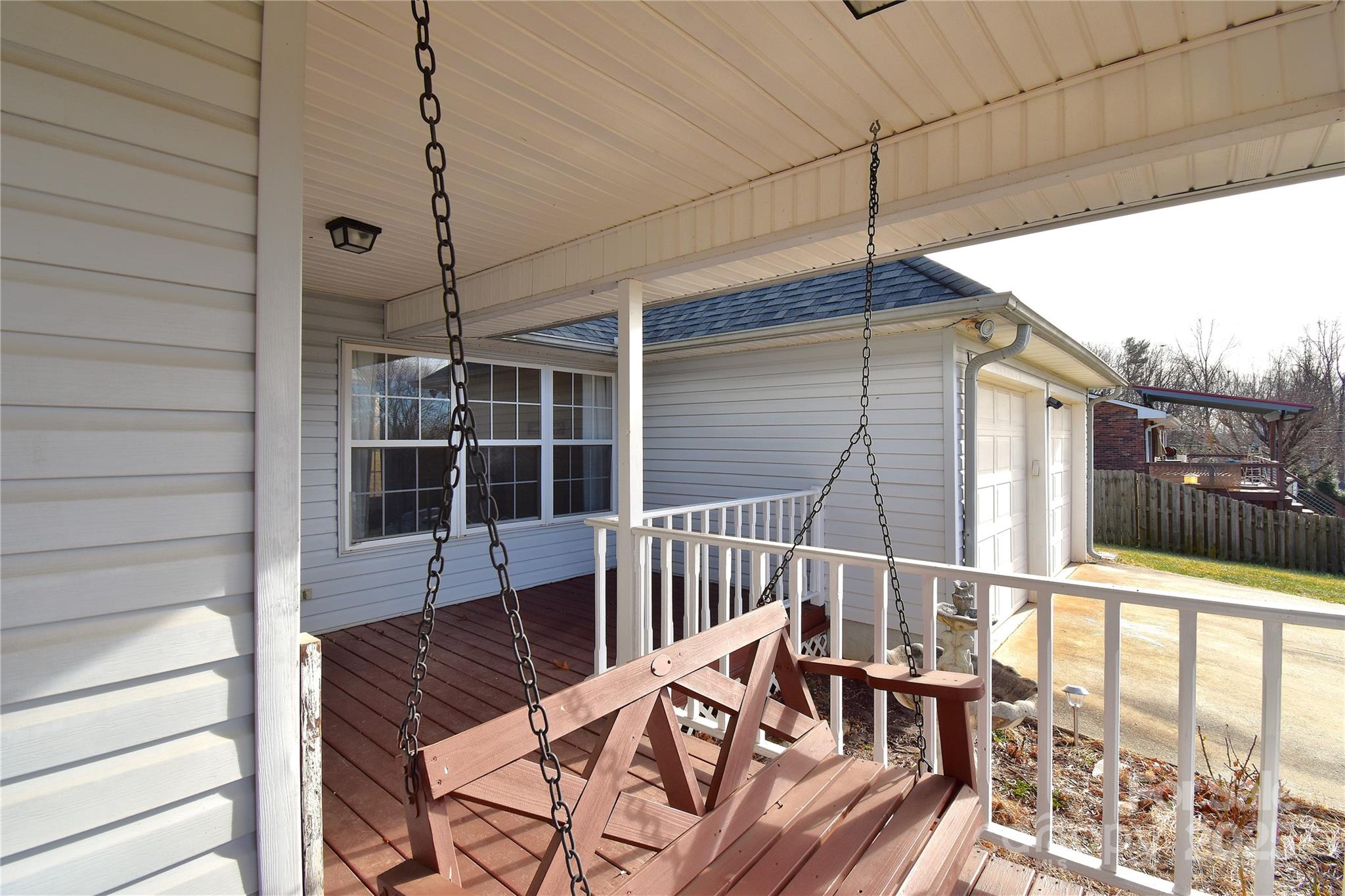 233 Ledbetter Road Arden, NC 28704 - Photo 37 of 45 a view of balcony with wooden floor and outdoor seating