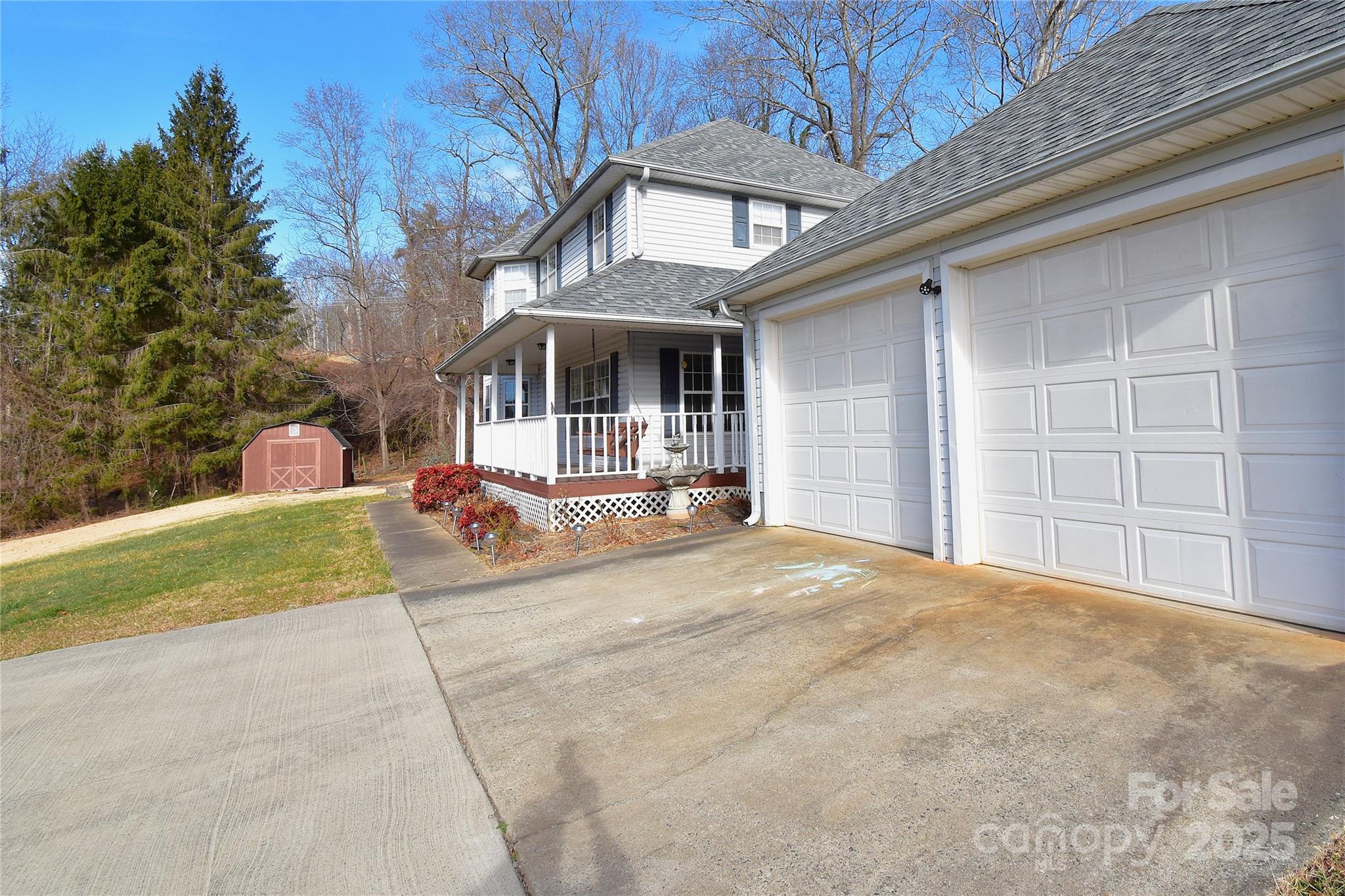 233 Ledbetter Road Arden, NC 28704 - Photo 38 of 45 a front view of a house with a yard and garage