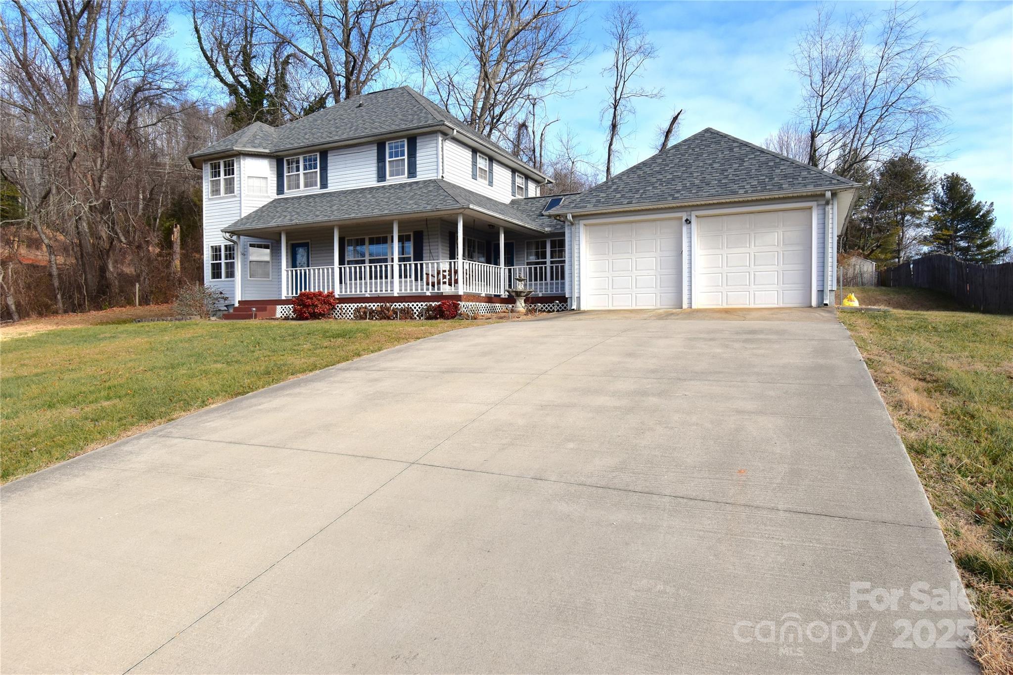 233 Ledbetter Road Arden, NC 28704 - Photo 43 of 45 front view of a brick house with a yard