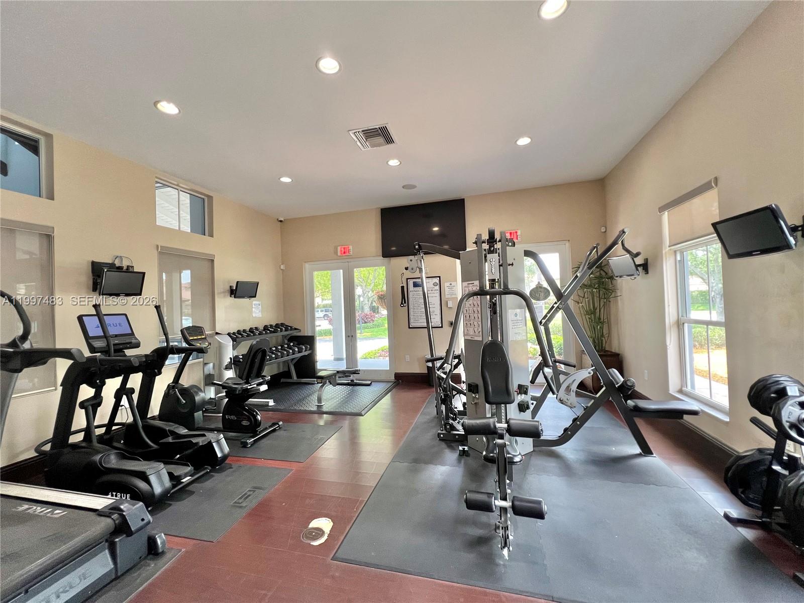 3910 Northeast 13th Drive Homestead, FL 33033 - Photo 35 of 35 a view of a room with gym equipment