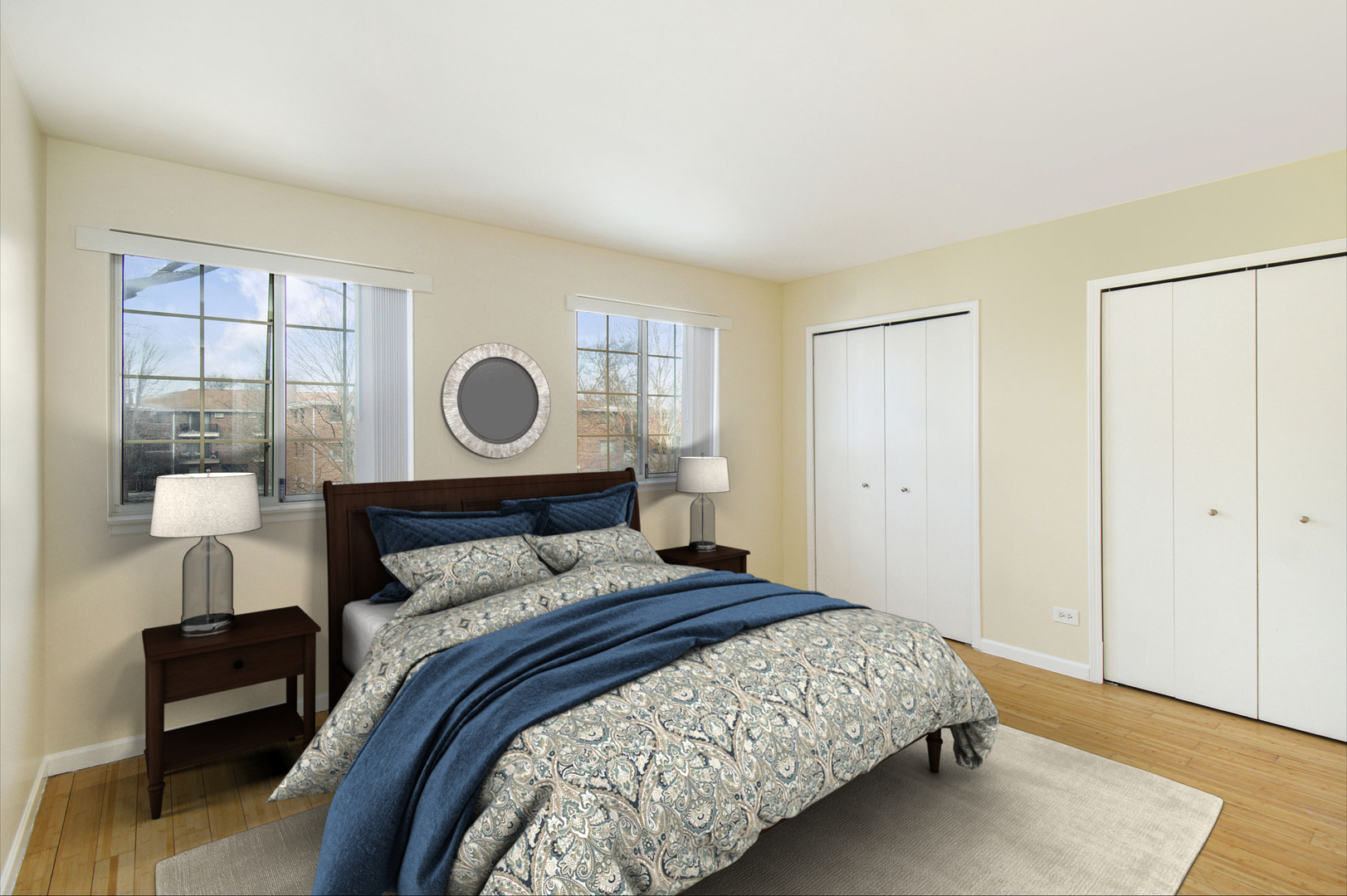 1334 South Lorraine Road, Unit F Wheaton, IL 60189 - Photo 8 of 12 a bedroom with a bed and a lamp on table