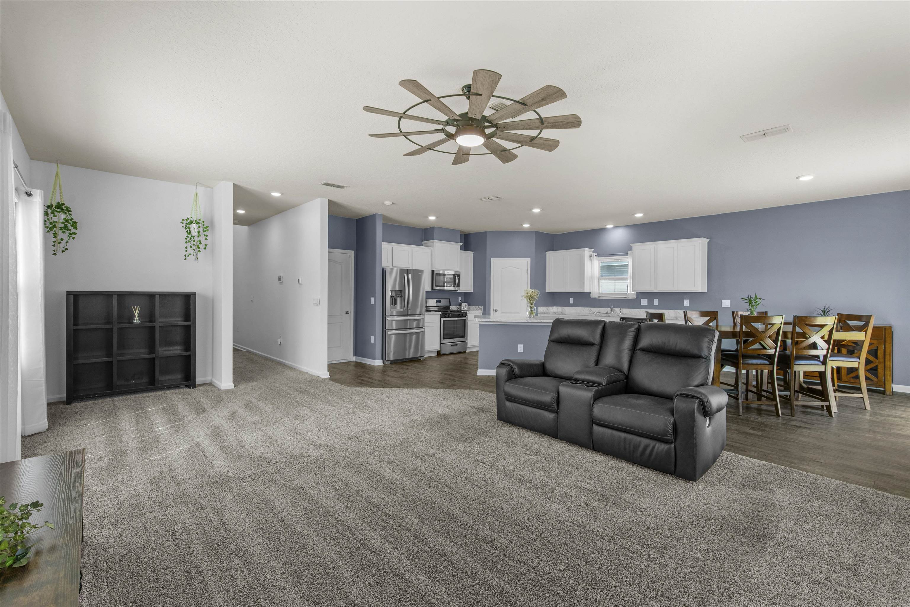 266 Caminha Road St. Augustine, FL 32084 - Photo 13 of 59 a living room with furniture and kitchen view