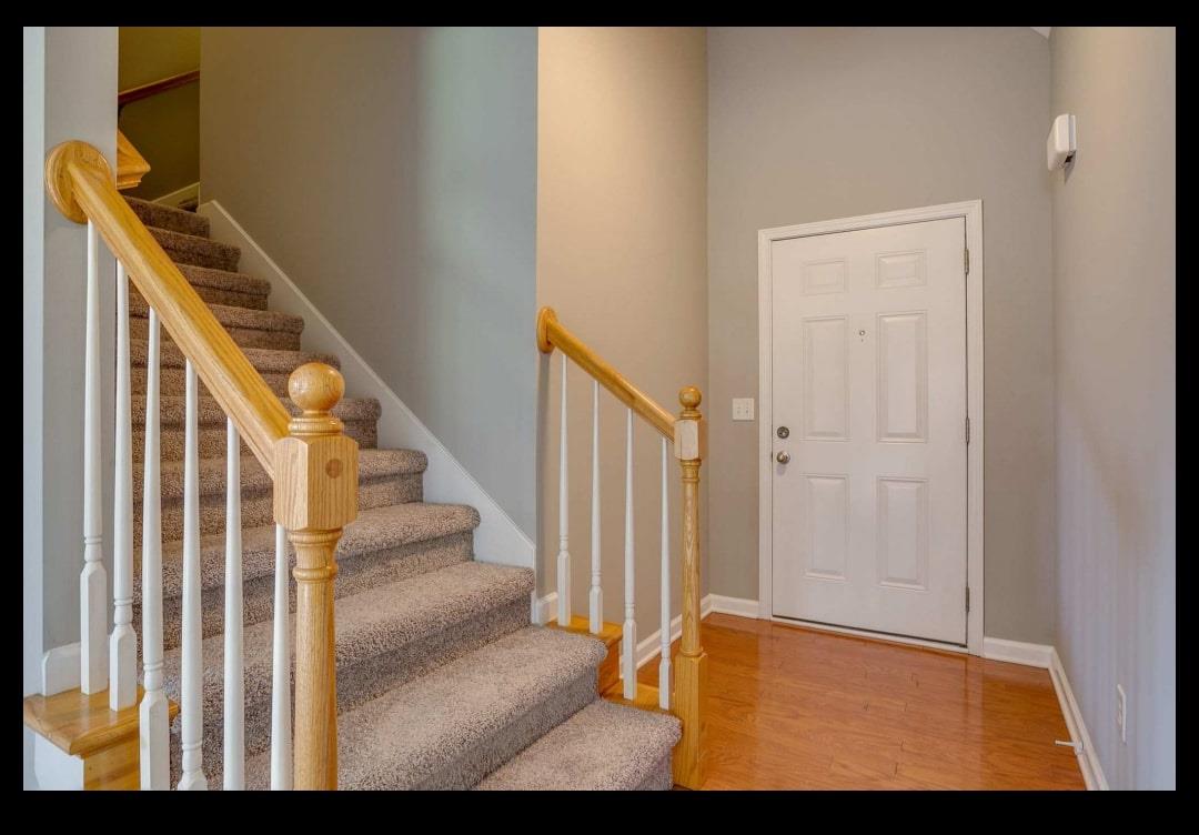 Entry foyer with staircase to bonus room