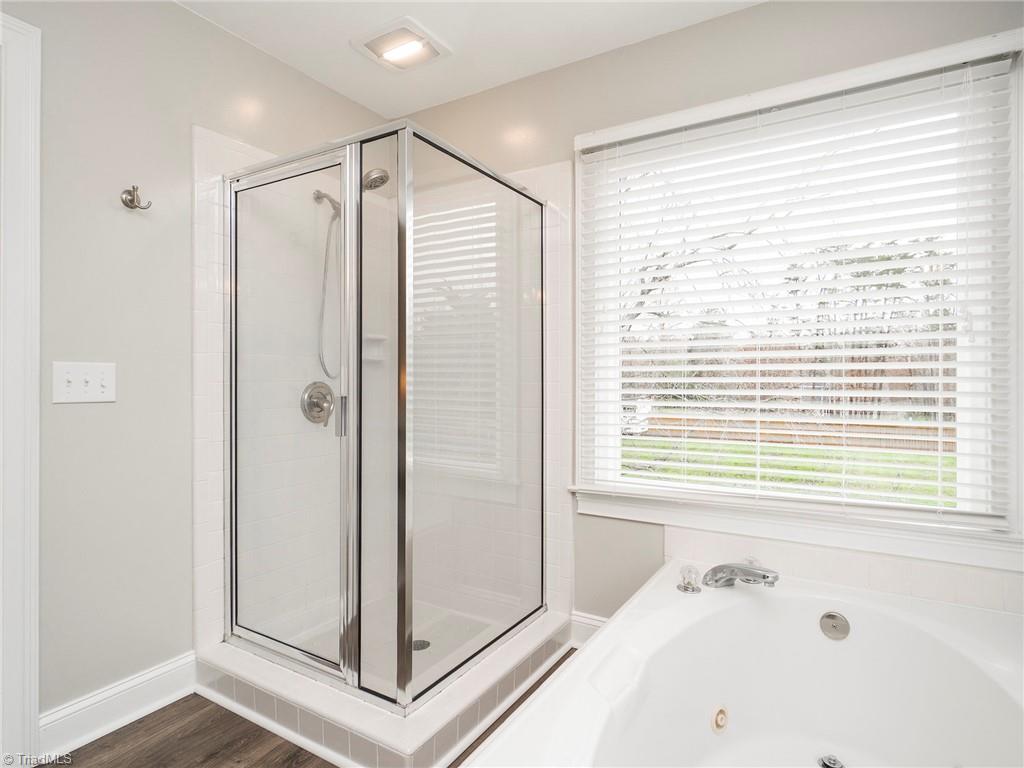 2811 Norwell Court Oak Ridge, NC 27310 - Photo 26 of 50 Separate shower and jetted tub in primary bath.