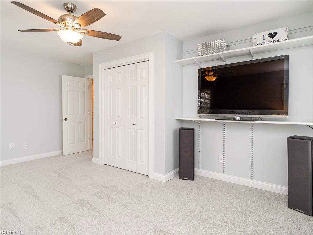 2811 Norwell Court Oak Ridge, NC 27310 - Photo 29 of 50 2nd bedroom would also make a great play room or theater room due to the great size!