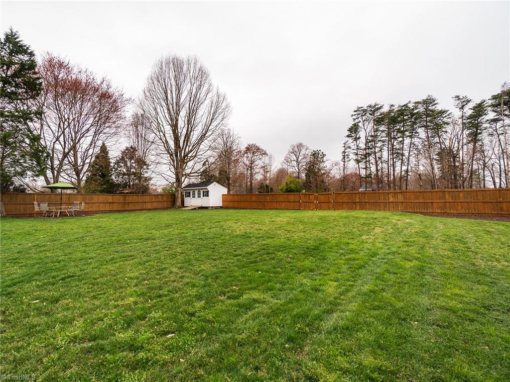 2811 Norwell Court Oak Ridge, NC 27310 - Photo 43 of 50 This backyard is made for entertaining!! This large flat space is perfect for outdoor events, backyard sporting events and more!