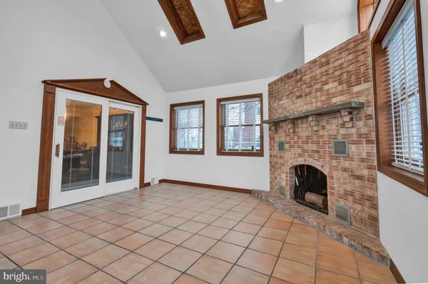 a view of livingroom with furniture and fireplace