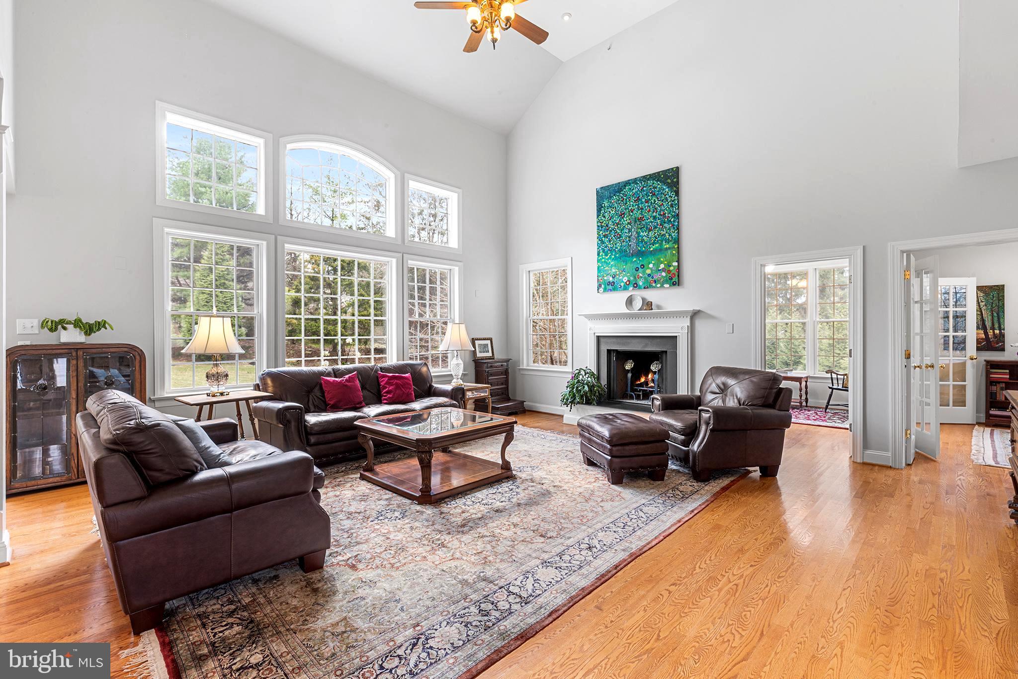 371 Trillium Lane Wayne, PA 19087 - Photo 18 of 43 a living room with furniture windows and a fireplace