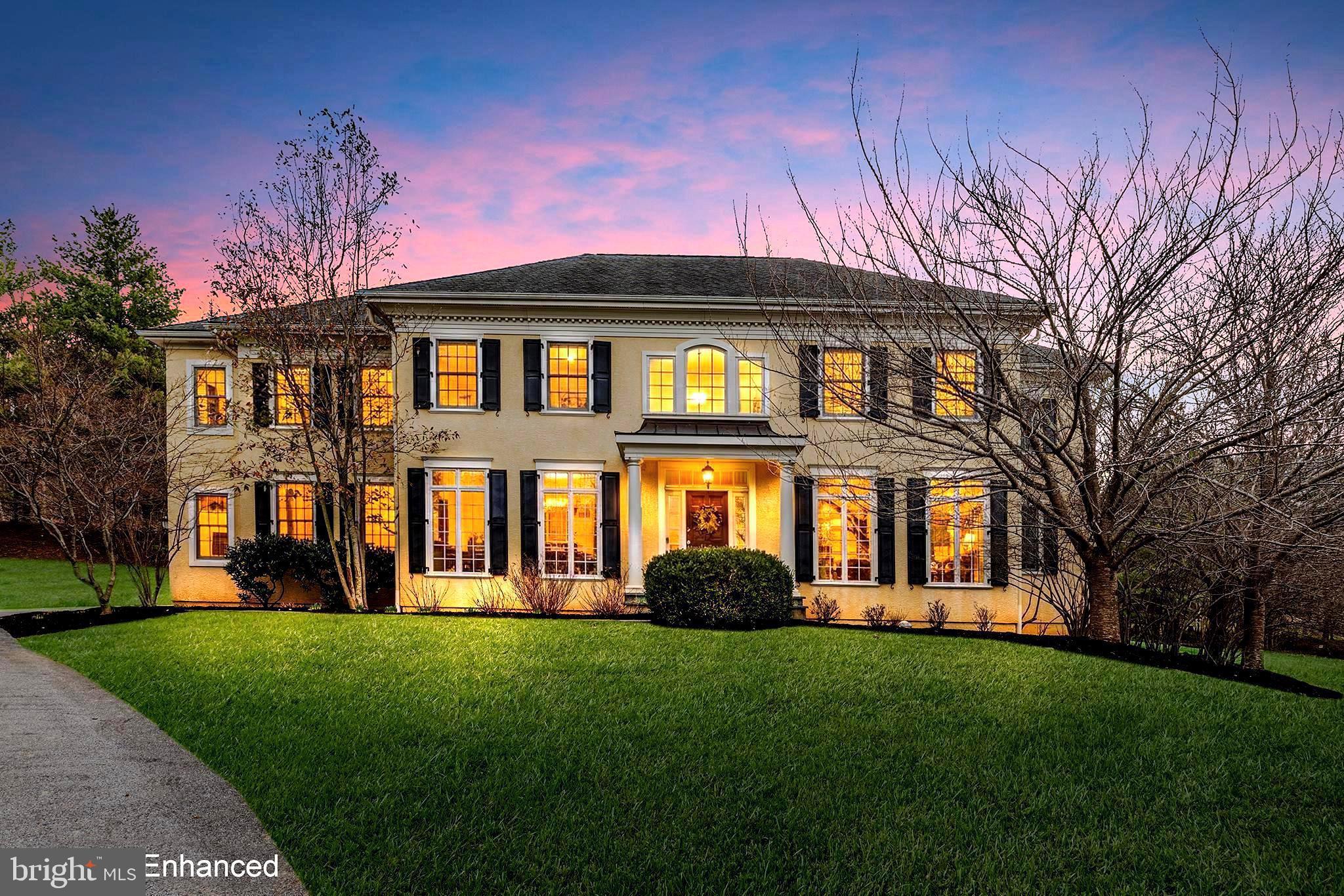 371 Trillium Lane Wayne, PA 19087 - Photo 2 of 43 a front view of a house with a garden