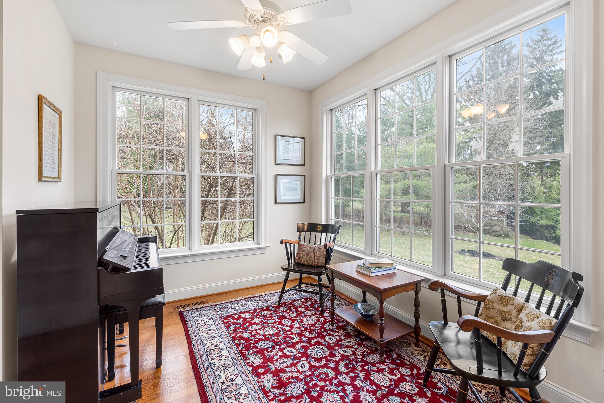 371 Trillium Lane Wayne, PA 19087 - Photo 22 of 43 a living room with furniture and a floor to ceiling window