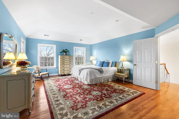 a living room with furniture rug and window