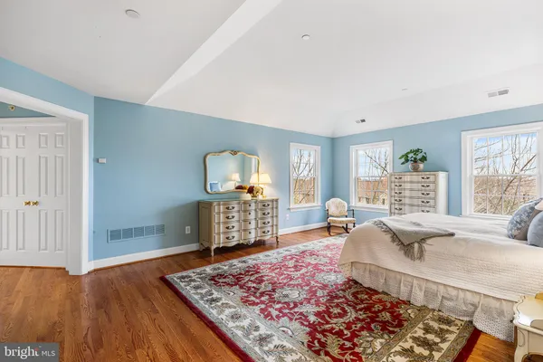 a living room with furniture rug and window