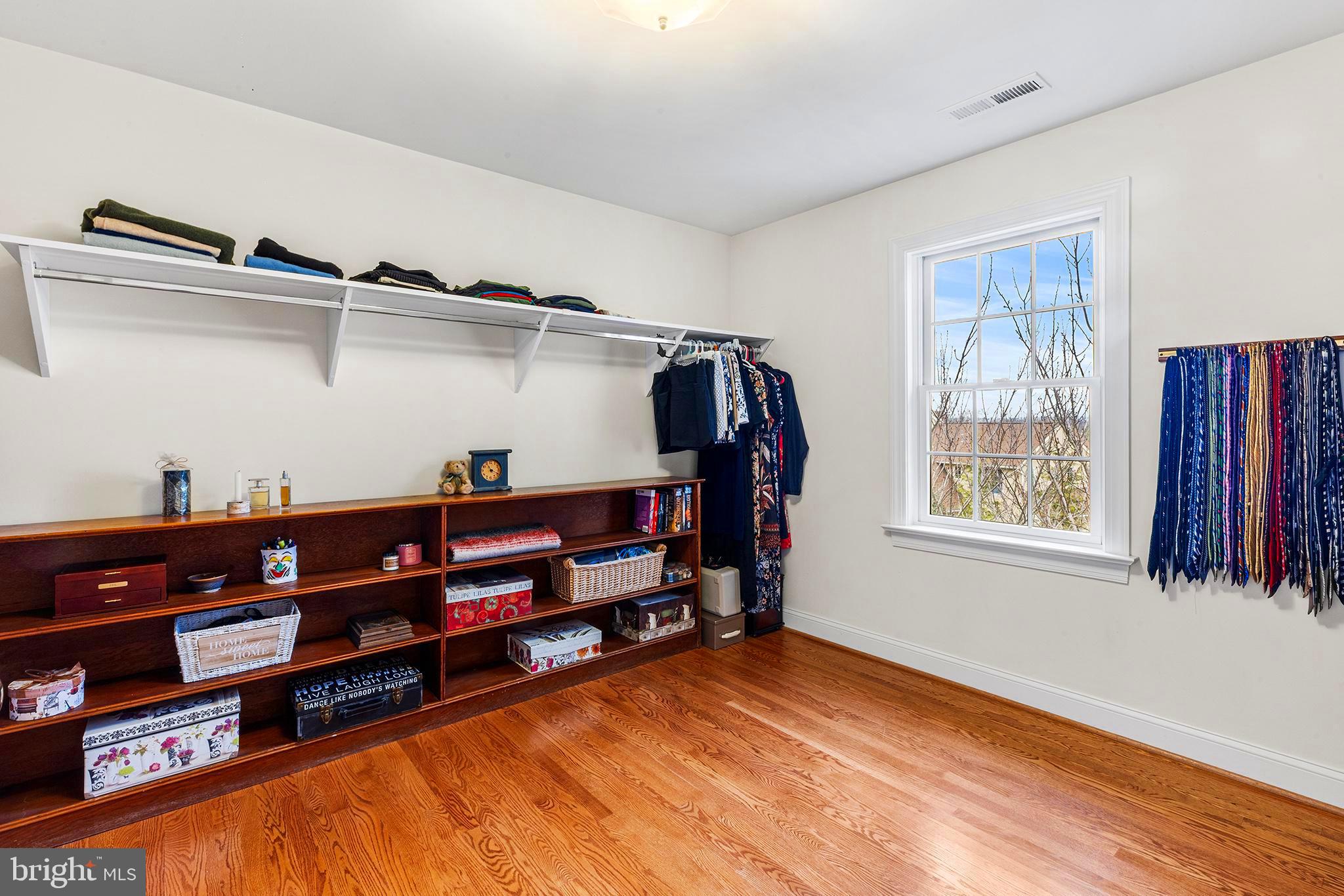 371 Trillium Lane Wayne, PA 19087 - Photo 30 of 43 a view of walk in closet with clothes and shoes