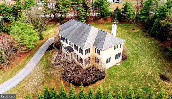 a view of swimming pool with a yard