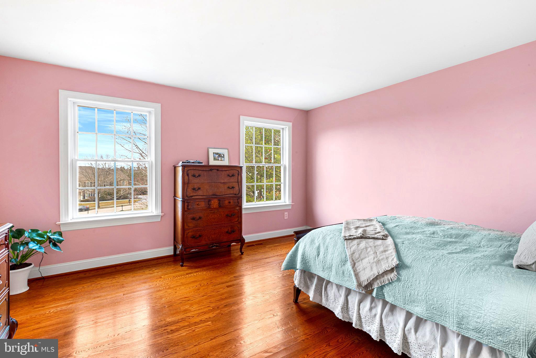 371 Trillium Lane Wayne, PA 19087 - Photo 31 of 43 a spacious bedroom with a bed and wooden floor