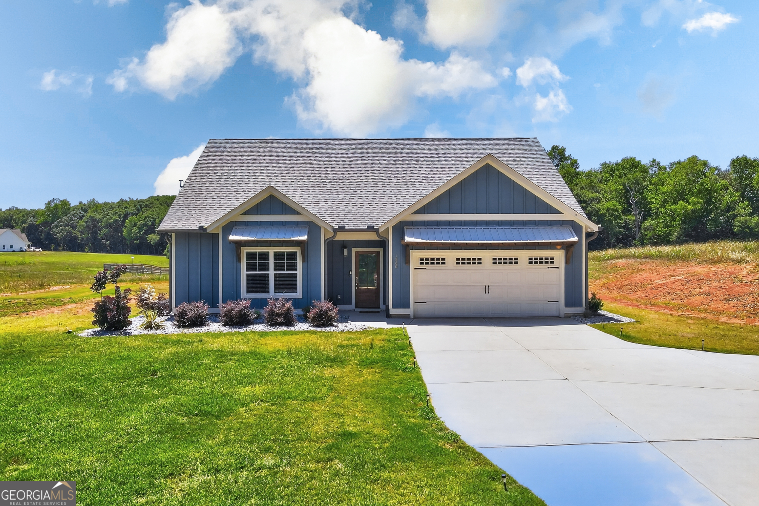 1350-c O Draper Road Comer, GA 30629 - Photo 3 of 47 a front view of house with yard and green space